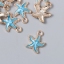 Декор для творчества металл, эмаль "Морская звезда" голубой 1,5х2 см             t('фото') 111095
